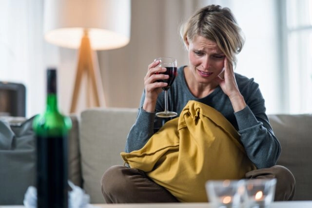 depressed woman indoors at home mental health and alcohol addiction concept depressed woman indoors at home, mental health and alcohol addiction concept