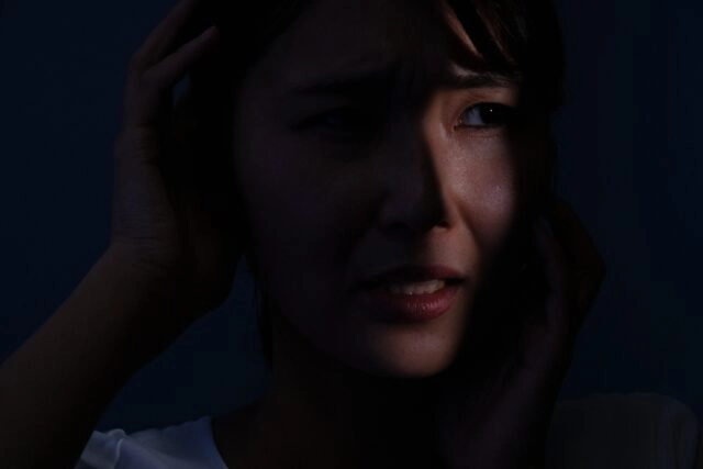 woman suffering from paranoia woman suffering from paranoia