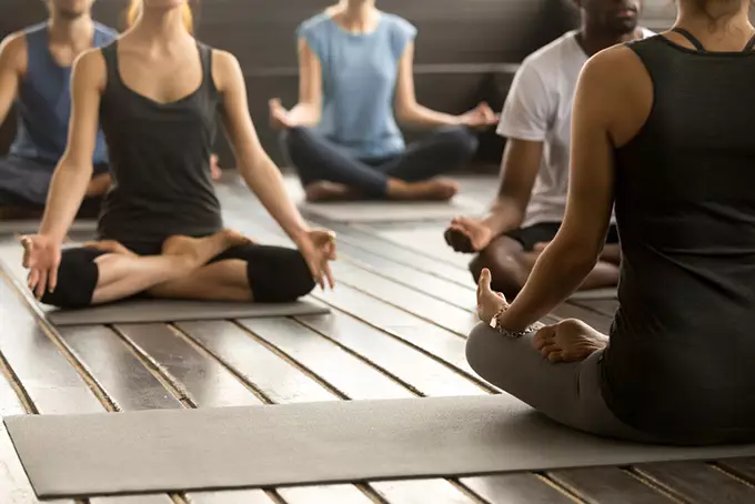 People practice yoga as a holistic therapy for addiction.